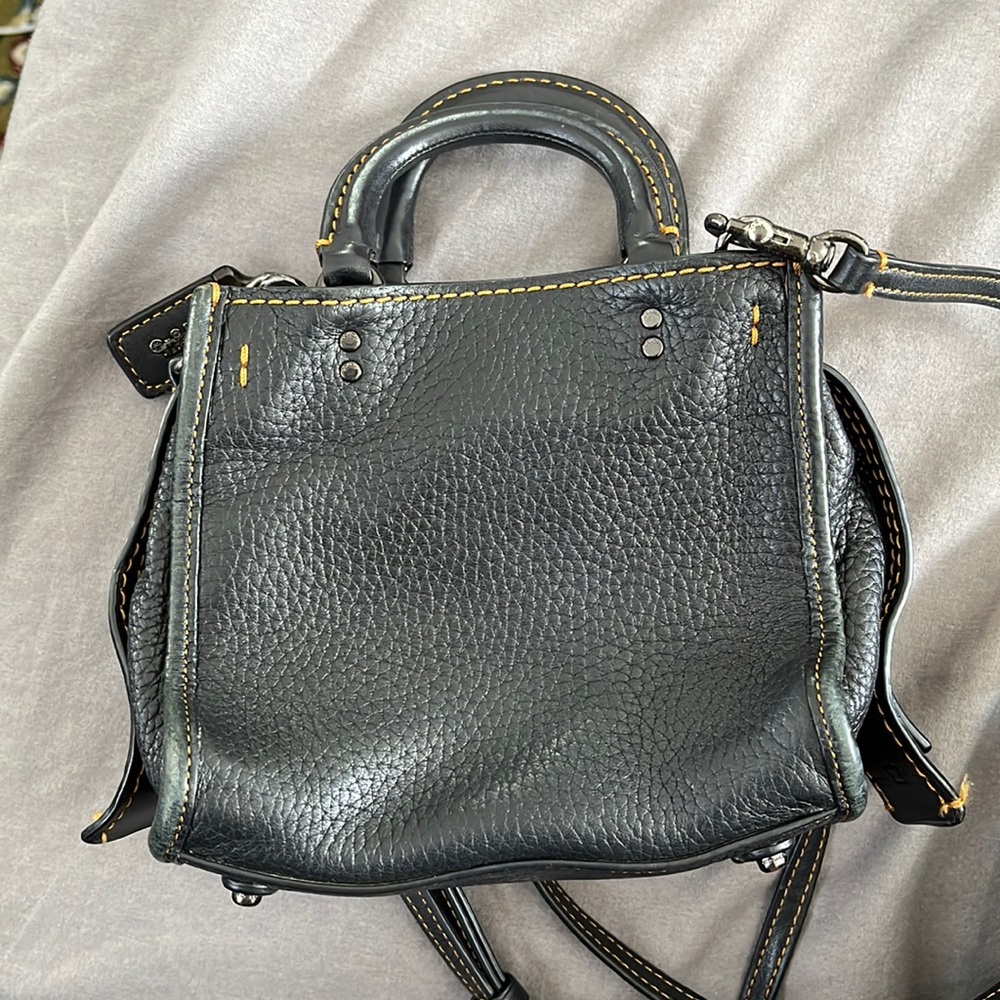 Black pebbled leather, suede interior Coach Rogue 17 mini. Used, okay condition.